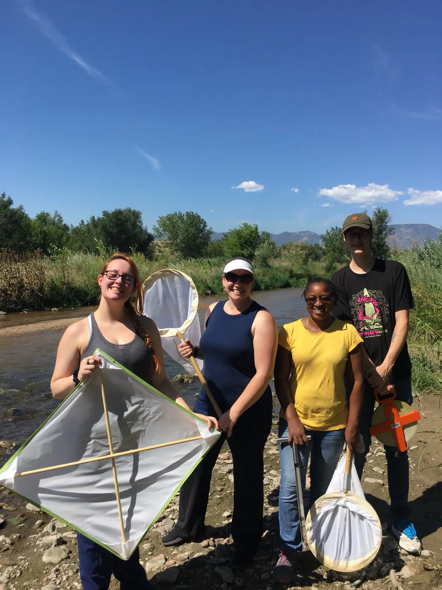 students doing field ecology research